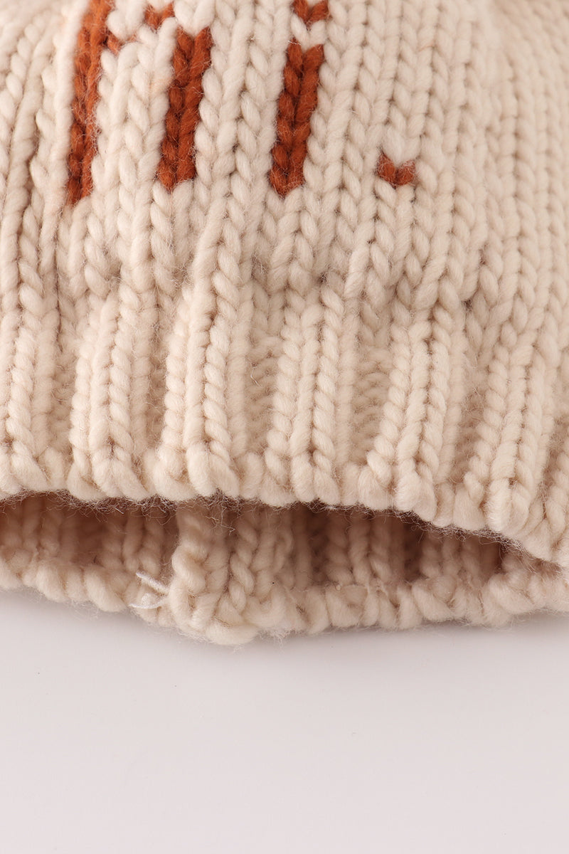 Beige pompom hi cable beanie hat