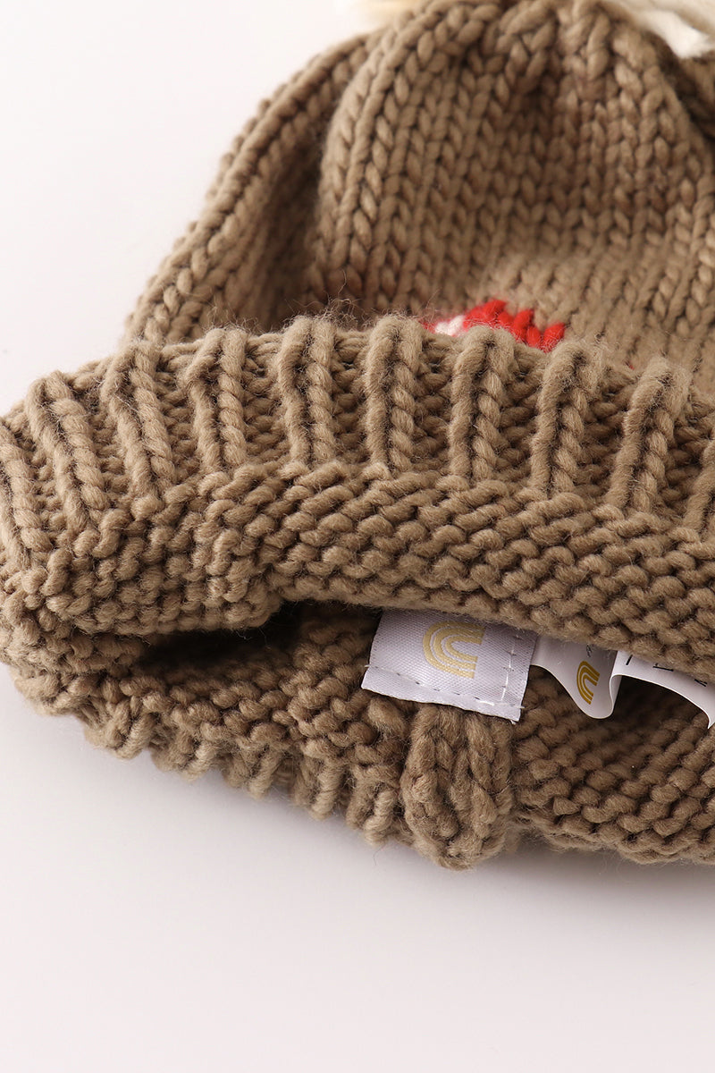 Brown pompom mushroom cable beanie hat