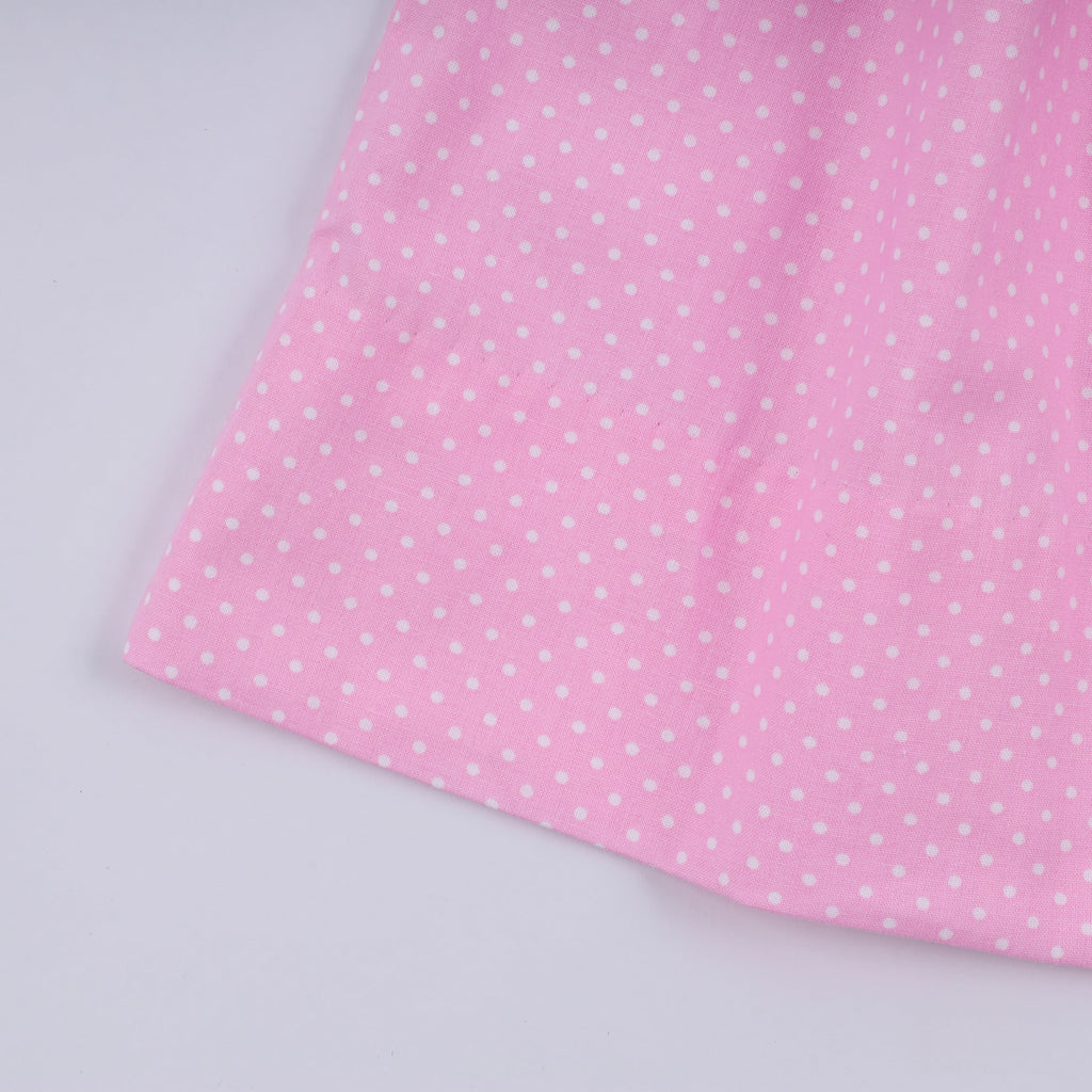 Pink character hand smocked dot ruffle dress