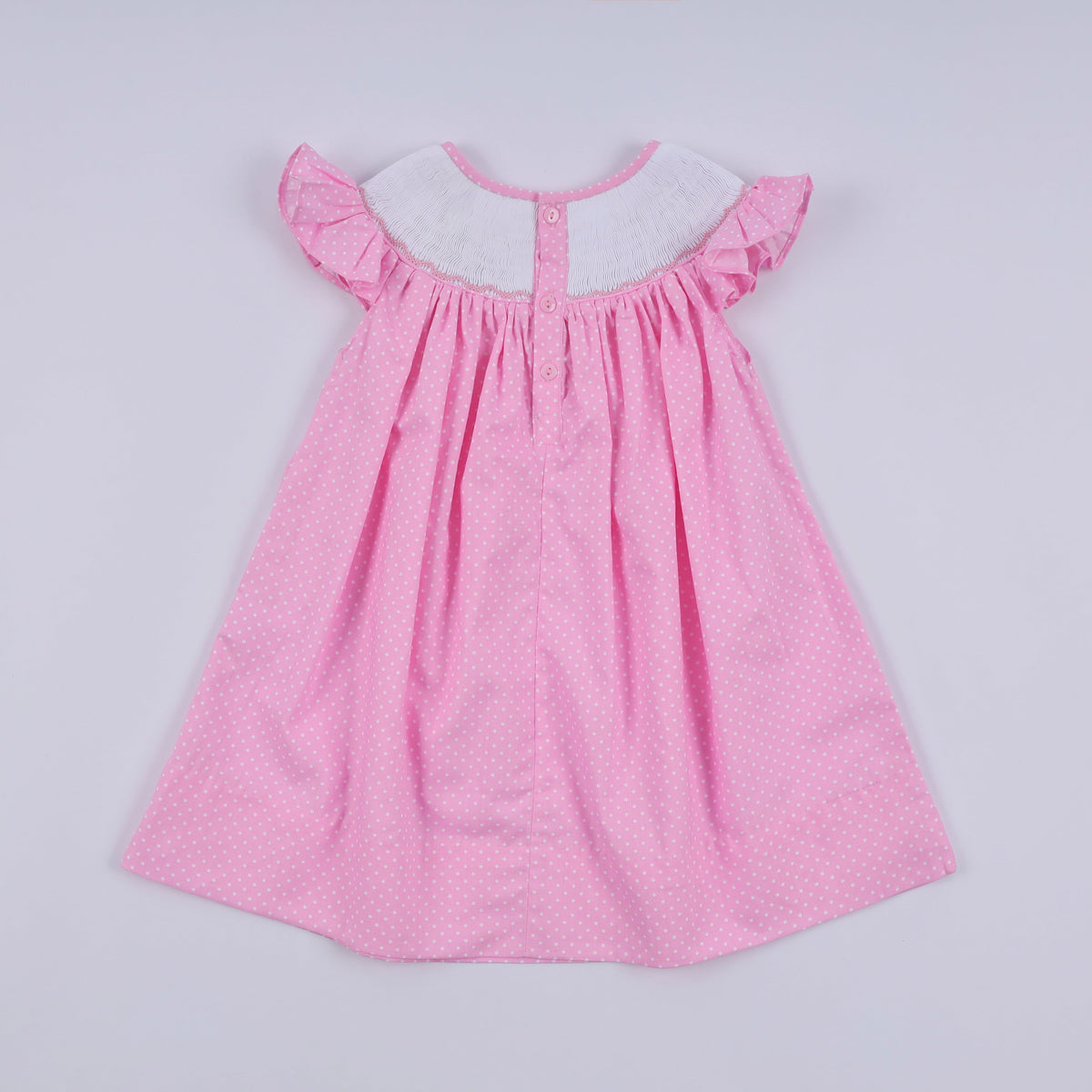 Pink character hand smocked dot ruffle dress