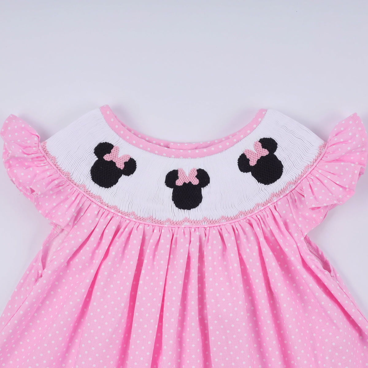 Pink character hand smocked dot ruffle pants set