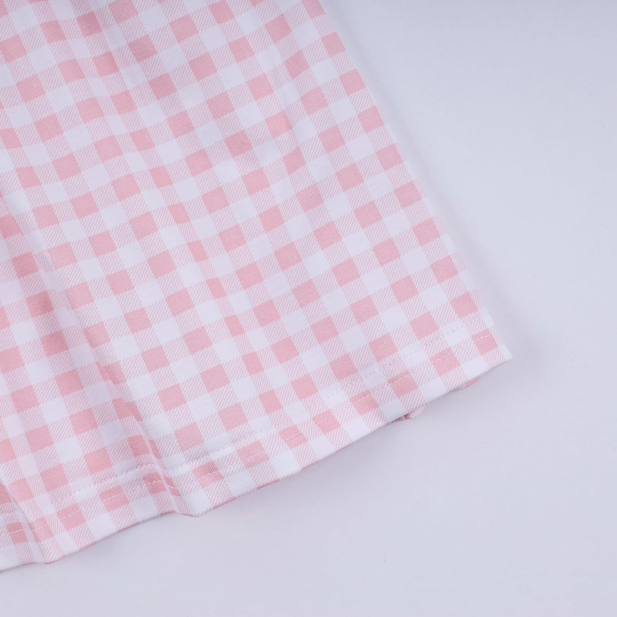 Pink character hand smocked gingham ruffle dress